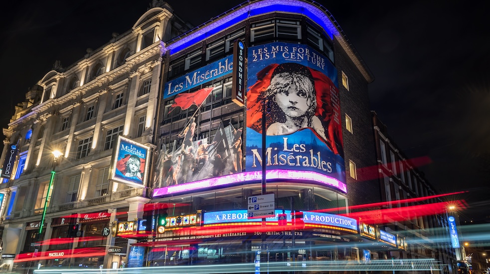 Night view of the Sondheim Theatre with Les Miserables in London